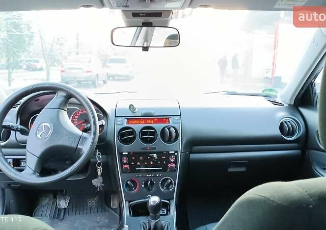 Серый Мазда 6, объемом двигателя 1.8 л и пробегом 202 тыс. км за 5500 $, фото 2 на Automoto.ua