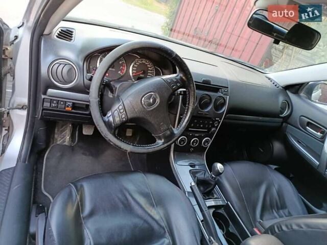 Серый Мазда 6, объемом двигателя 1.8 л и пробегом 285 тыс. км за 4850 $, фото 3 на Automoto.ua
