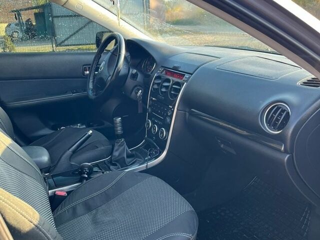 Сірий Мазда 6, об'ємом двигуна 2 л та пробігом 237 тис. км за 5300 $, фото 4 на Automoto.ua