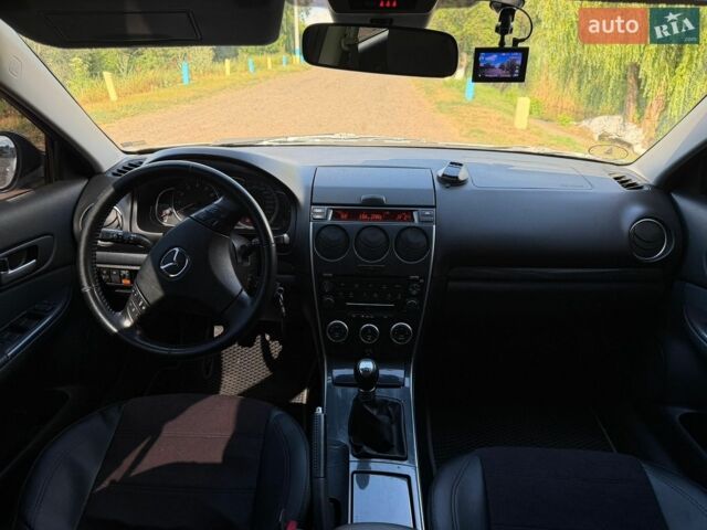 Серый Мазда 6, объемом двигателя 2 л и пробегом 230 тыс. км за 5800 $, фото 12 на Automoto.ua