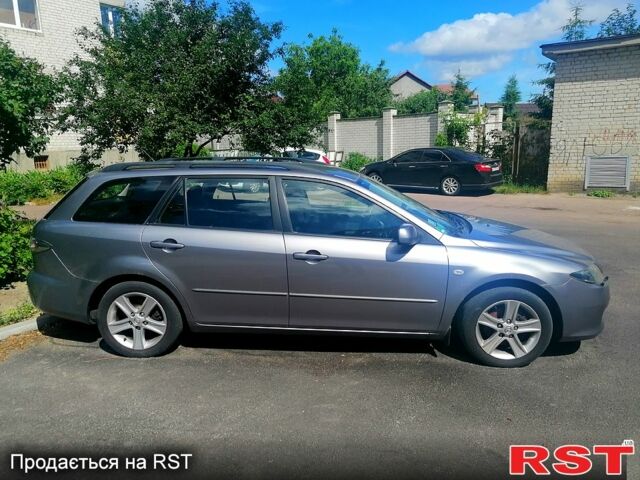 Серый Мазда 6, объемом двигателя 2 л и пробегом 267 тыс. км за 5000 $, фото 1 на Automoto.ua