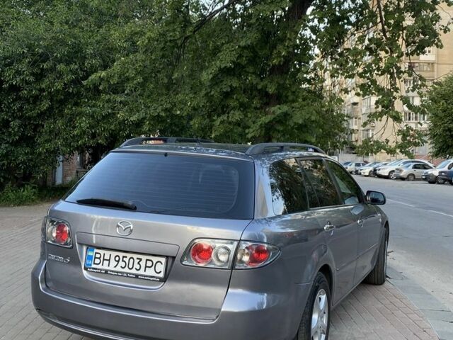 Сірий Мазда 6, об'ємом двигуна 2 л та пробігом 221 тис. км за 3850 $, фото 2 на Automoto.ua