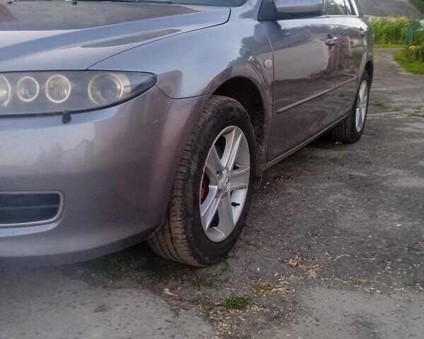 Сірий Мазда 6, об'ємом двигуна 2 л та пробігом 250 тис. км за 5900 $, фото 9 на Automoto.ua