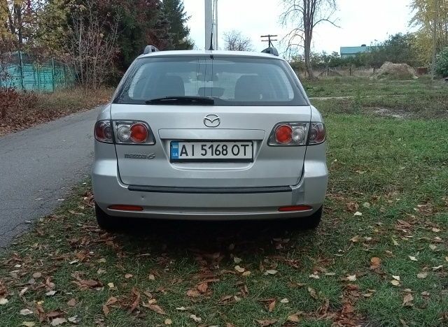 Серый Мазда 6, объемом двигателя 2 л и пробегом 247 тыс. км за 4000 $, фото 2 на Automoto.ua