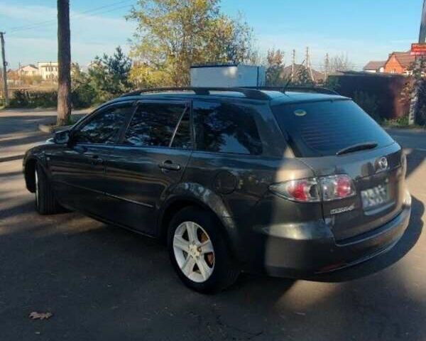 Серый Мазда 6, объемом двигателя 2 л и пробегом 200 тыс. км за 4900 $, фото 1 на Automoto.ua