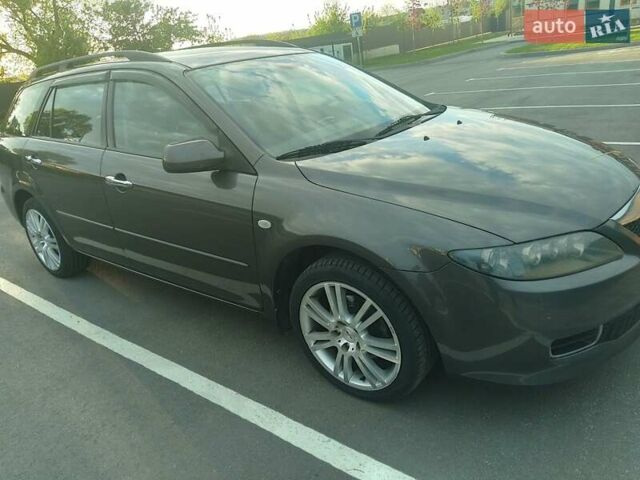 Сірий Мазда 6, об'ємом двигуна 2 л та пробігом 258 тис. км за 5300 $, фото 3 на Automoto.ua