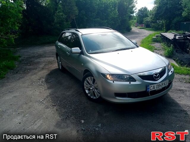 Серый Мазда 6, объемом двигателя 2 л и пробегом 220 тыс. км за 5700 $, фото 1 на Automoto.ua
