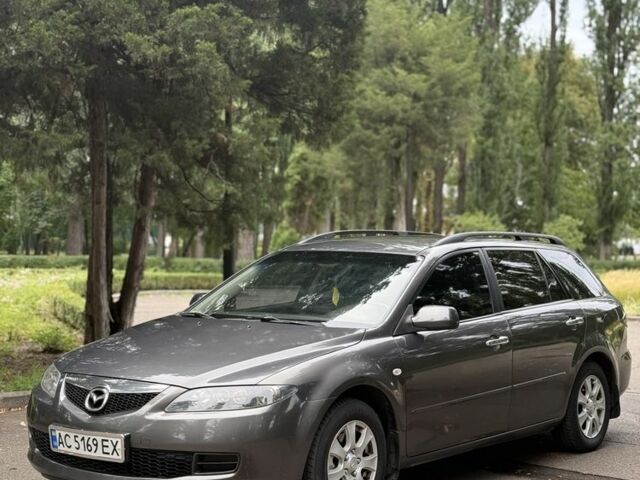 Серый Мазда 6, объемом двигателя 2 л и пробегом 297 тыс. км за 4003 $, фото 1 на Automoto.ua