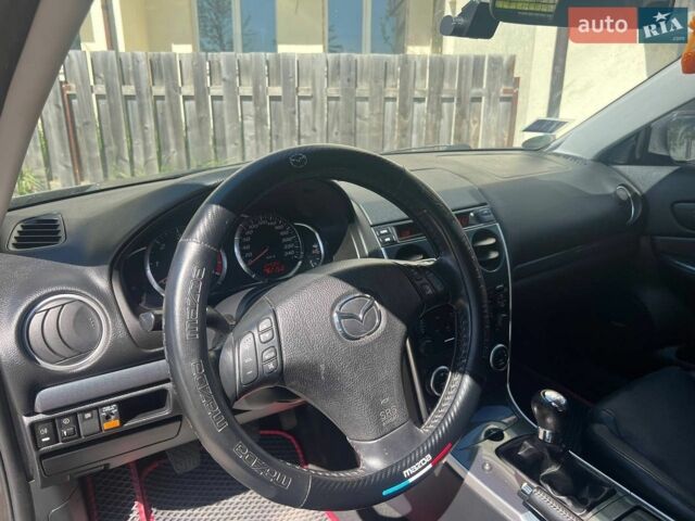 Серый Мазда 6, объемом двигателя 2 л и пробегом 250 тыс. км за 5400 $, фото 26 на Automoto.ua
