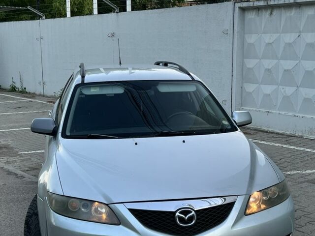 Сірий Мазда 6, об'ємом двигуна 2 л та пробігом 235 тис. км за 3456 $, фото 2 на Automoto.ua