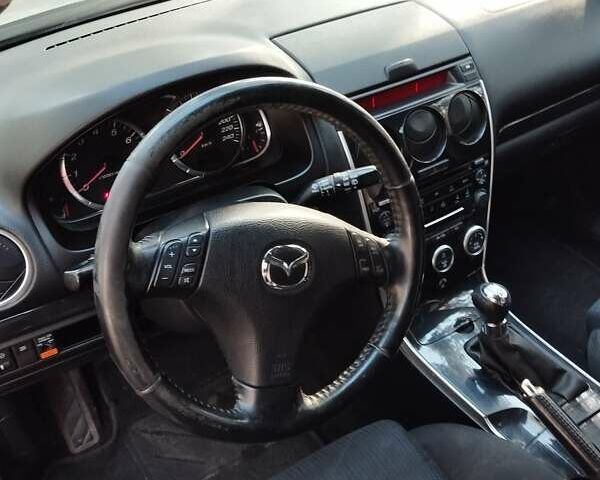 Серый Мазда 6, объемом двигателя 2 л и пробегом 192 тыс. км за 5500 $, фото 46 на Automoto.ua
