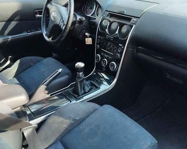 Серый Мазда 6, объемом двигателя 2 л и пробегом 192 тыс. км за 5500 $, фото 34 на Automoto.ua