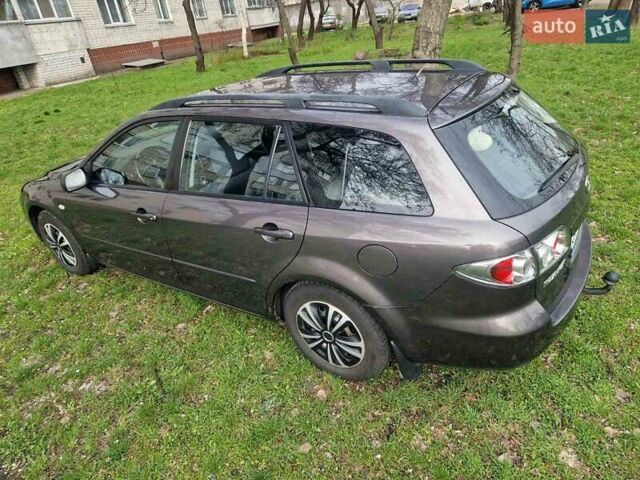 Серый Мазда 6, объемом двигателя 2 л и пробегом 145 тыс. км за 5300 $, фото 5 на Automoto.ua