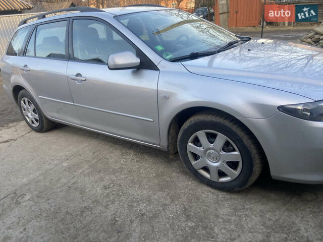 Серый Мазда 6, объемом двигателя 2 л и пробегом 236 тыс. км за 4850 $, фото 2 на Automoto.ua