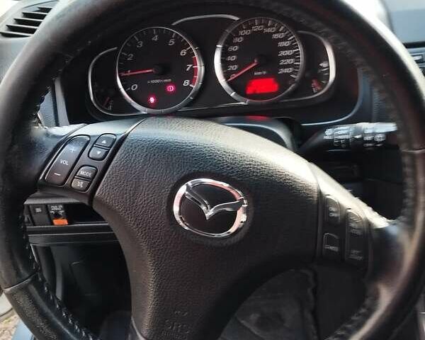 Серый Мазда 6, объемом двигателя 2 л и пробегом 192 тыс. км за 5500 $, фото 43 на Automoto.ua