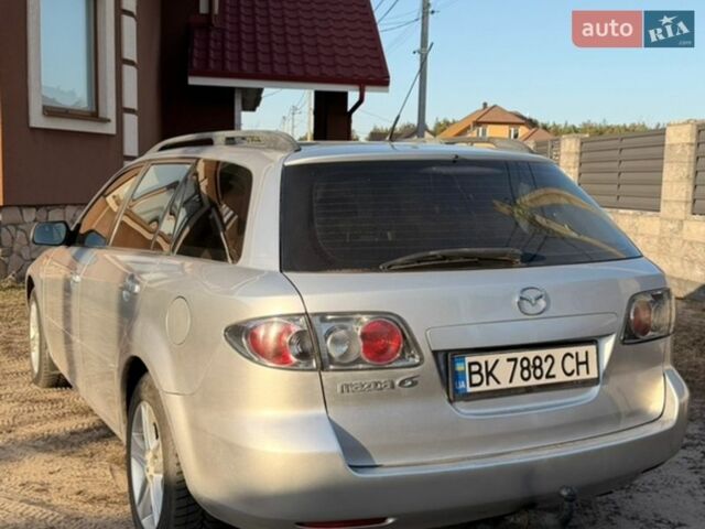 Сірий Мазда 6, об'ємом двигуна 2 л та пробігом 336 тис. км за 4999 $, фото 2 на Automoto.ua