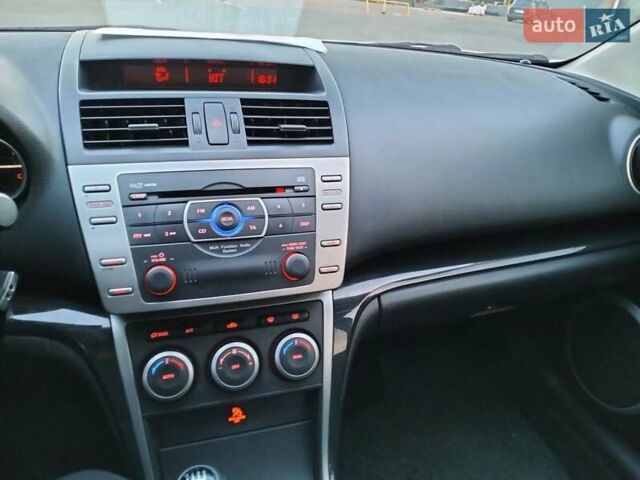 Серый Мазда 6, объемом двигателя 2 л и пробегом 255 тыс. км за 8000 $, фото 2 на Automoto.ua