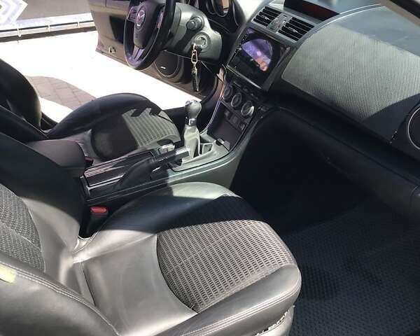 Серый Мазда 6, объемом двигателя 2 л и пробегом 301 тыс. км за 6600 $, фото 12 на Automoto.ua