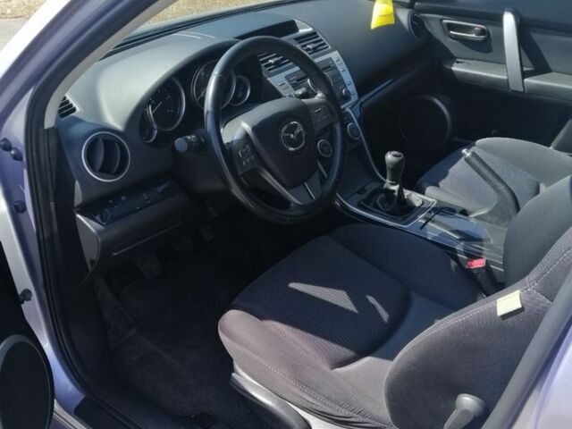 Серый Мазда 6, объемом двигателя 2 л и пробегом 323 тыс. км за 6000 $, фото 1 на Automoto.ua