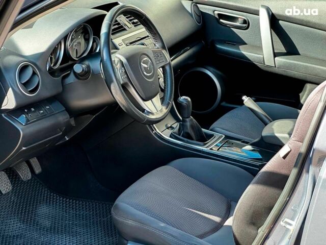 Сірий Мазда 6, об'ємом двигуна 2 л та пробігом 228 тис. км за 6990 $, фото 6 на Automoto.ua