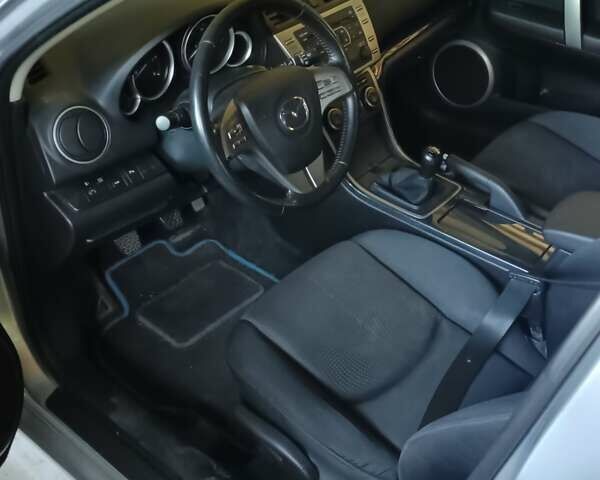 Серый Мазда 6, объемом двигателя 2 л и пробегом 250 тыс. км за 5500 $, фото 2 на Automoto.ua