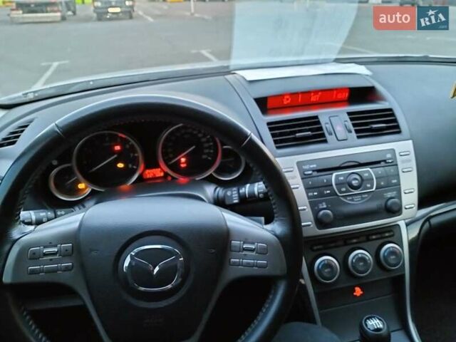 Серый Мазда 6, объемом двигателя 2 л и пробегом 255 тыс. км за 8000 $, фото 1 на Automoto.ua