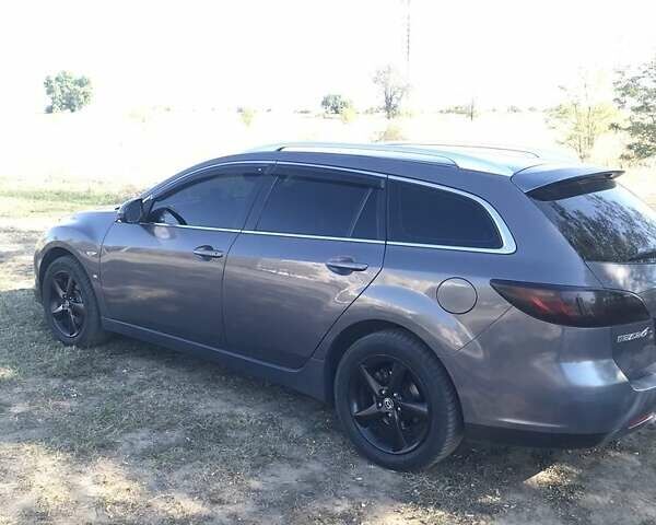 Серый Мазда 6, объемом двигателя 2 л и пробегом 301 тыс. км за 6600 $, фото 1 на Automoto.ua