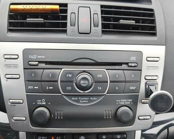 Сірий Мазда 6, об'ємом двигуна 2 л та пробігом 335 тис. км за 7000 $, фото 5 на Automoto.ua