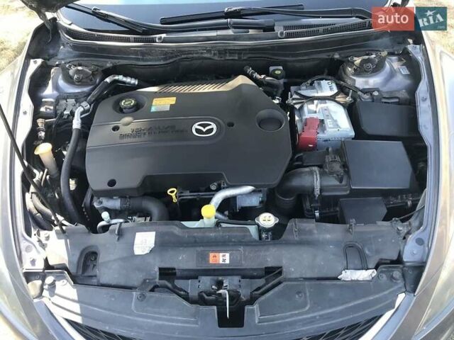 Серый Мазда 6, объемом двигателя 2 л и пробегом 301 тыс. км за 6600 $, фото 20 на Automoto.ua
