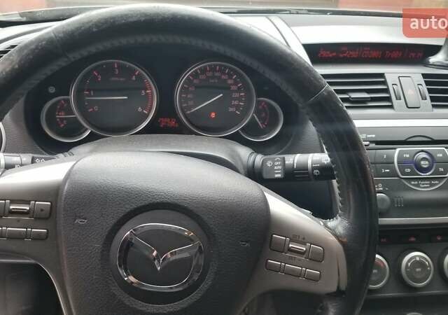 Серый Мазда 6, объемом двигателя 2 л и пробегом 299 тыс. км за 7600 $, фото 9 на Automoto.ua