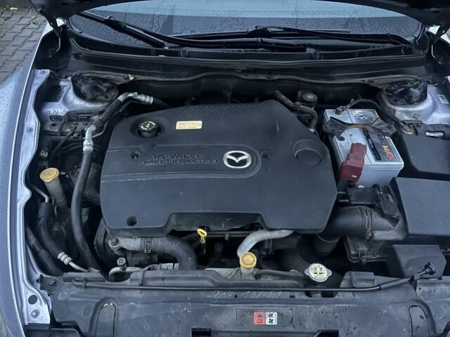 Сірий Мазда 6, об'ємом двигуна 2 л та пробігом 297 тис. км за 5999 $, фото 4 на Automoto.ua