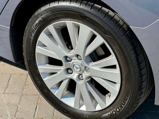 Серый Мазда 6, объемом двигателя 2 л и пробегом 228 тыс. км за 6540 $, фото 1 на Automoto.ua