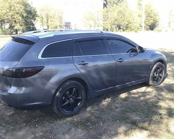 Серый Мазда 6, объемом двигателя 2 л и пробегом 301 тыс. км за 6600 $, фото 2 на Automoto.ua