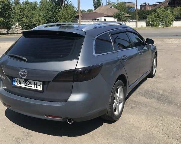 Серый Мазда 6, объемом двигателя 2 л и пробегом 301 тыс. км за 6600 $, фото 5 на Automoto.ua