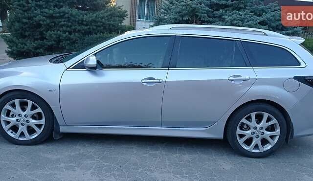 Серый Мазда 6, объемом двигателя 2.2 л и пробегом 235 тыс. км за 9000 $, фото 1 на Automoto.ua