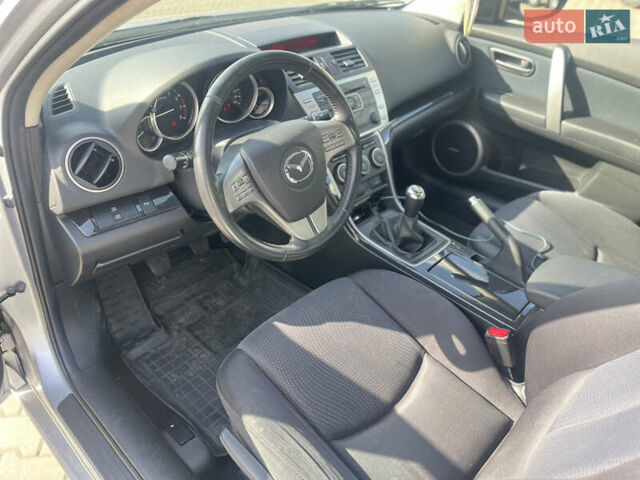 Серый Мазда 6, объемом двигателя 1.8 л и пробегом 265 тыс. км за 6850 $, фото 6 на Automoto.ua