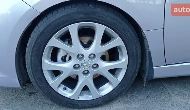 Серый Мазда 6, объемом двигателя 2.2 л и пробегом 235 тыс. км за 9000 $, фото 17 на Automoto.ua