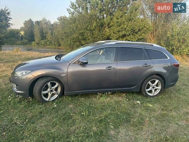 Серый Мазда 6, объемом двигателя 2 л и пробегом 245 тыс. км за 7000 $, фото 1 на Automoto.ua