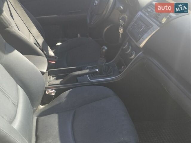 Серый Мазда 6, объемом двигателя 2.18 л и пробегом 300 тыс. км за 5600 $, фото 1 на Automoto.ua