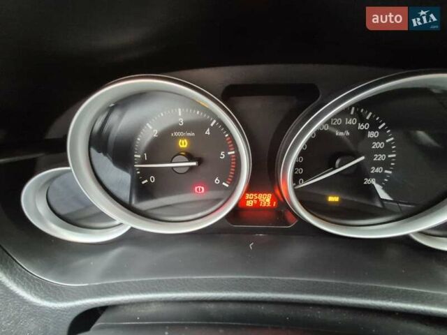 Серый Мазда 6, объемом двигателя 2.18 л и пробегом 318 тыс. км за 5500 $, фото 2 на Automoto.ua