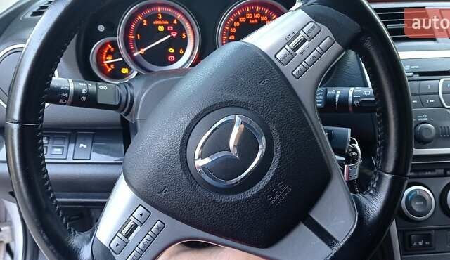 Серый Мазда 6, объемом двигателя 2.2 л и пробегом 235 тыс. км за 9000 $, фото 10 на Automoto.ua