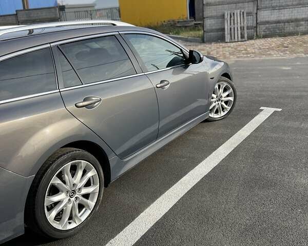 Сірий Мазда 6, об'ємом двигуна 2.18 л та пробігом 305 тис. км за 6999 $, фото 3 на Automoto.ua