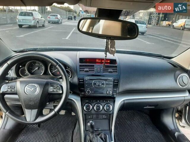 Серый Мазда 6, объемом двигателя 2.2 л и пробегом 288 тыс. км за 6200 $, фото 10 на Automoto.ua