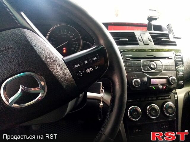 Серый Мазда 6, объемом двигателя 2.2 л и пробегом 335 тыс. км за 6100 $, фото 2 на Automoto.ua