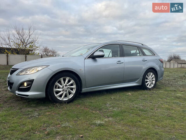 Сірий Мазда 6, об'ємом двигуна 2.2 л та пробігом 286 тис. км за 7450 $, фото 2 на Automoto.ua
