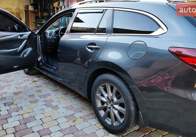 Серый Мазда 6, объемом двигателя 2.19 л и пробегом 226 тыс. км за 10500 $, фото 31 на Automoto.ua