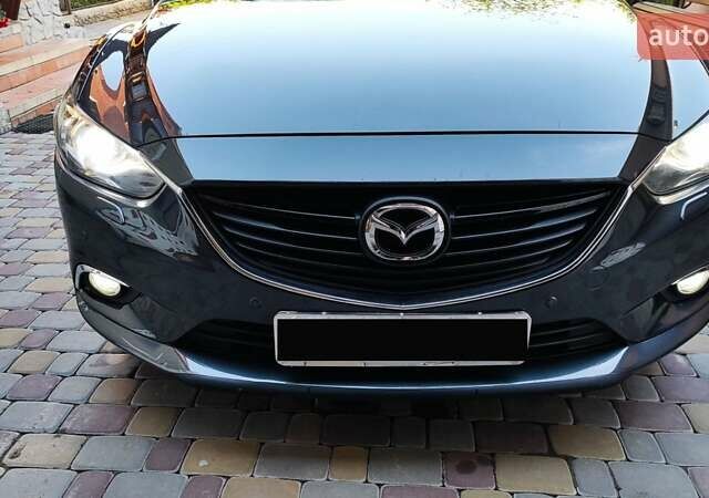 Серый Мазда 6, объемом двигателя 2.19 л и пробегом 226 тыс. км за 10500 $, фото 13 на Automoto.ua