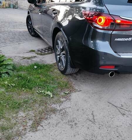 Серый Мазда 6, объемом двигателя 2.19 л и пробегом 226 тыс. км за 10500 $, фото 11 на Automoto.ua