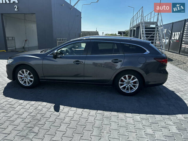 Сірий Мазда 6, об'ємом двигуна 2.19 л та пробігом 260 тис. км за 9500 $, фото 5 на Automoto.ua
