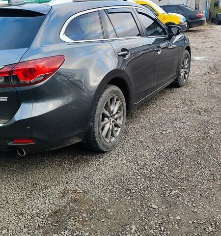 Серый Мазда 6, объемом двигателя 2.19 л и пробегом 226 тыс. км за 10500 $, фото 5 на Automoto.ua